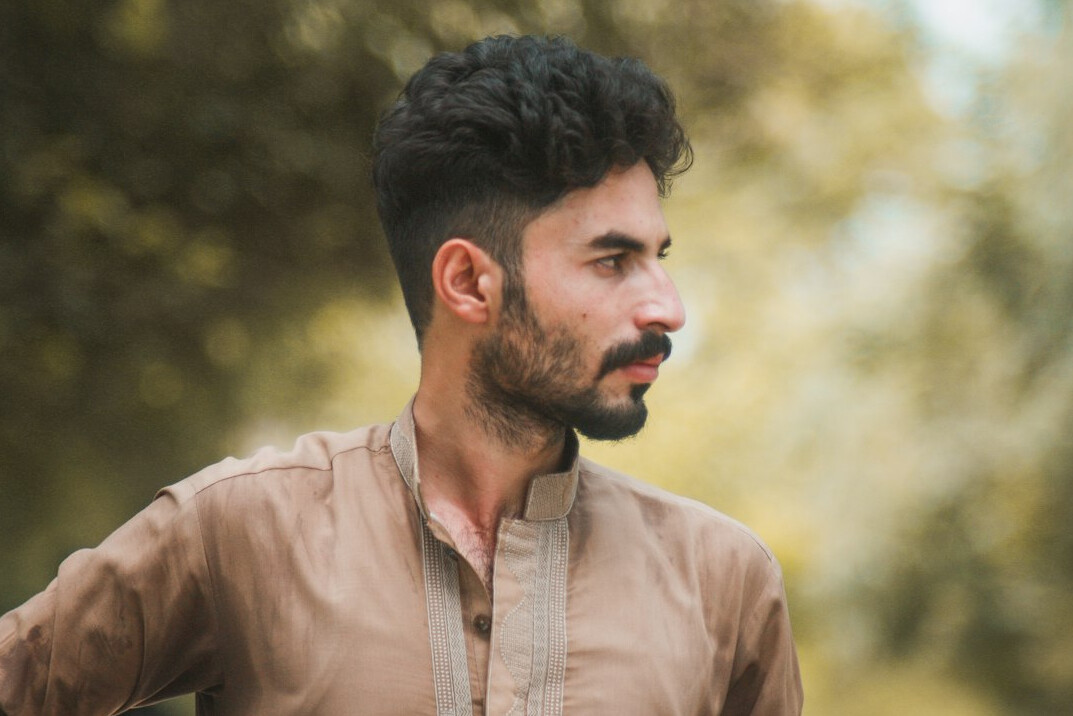 Portrait of a man in a shirt with a short beard