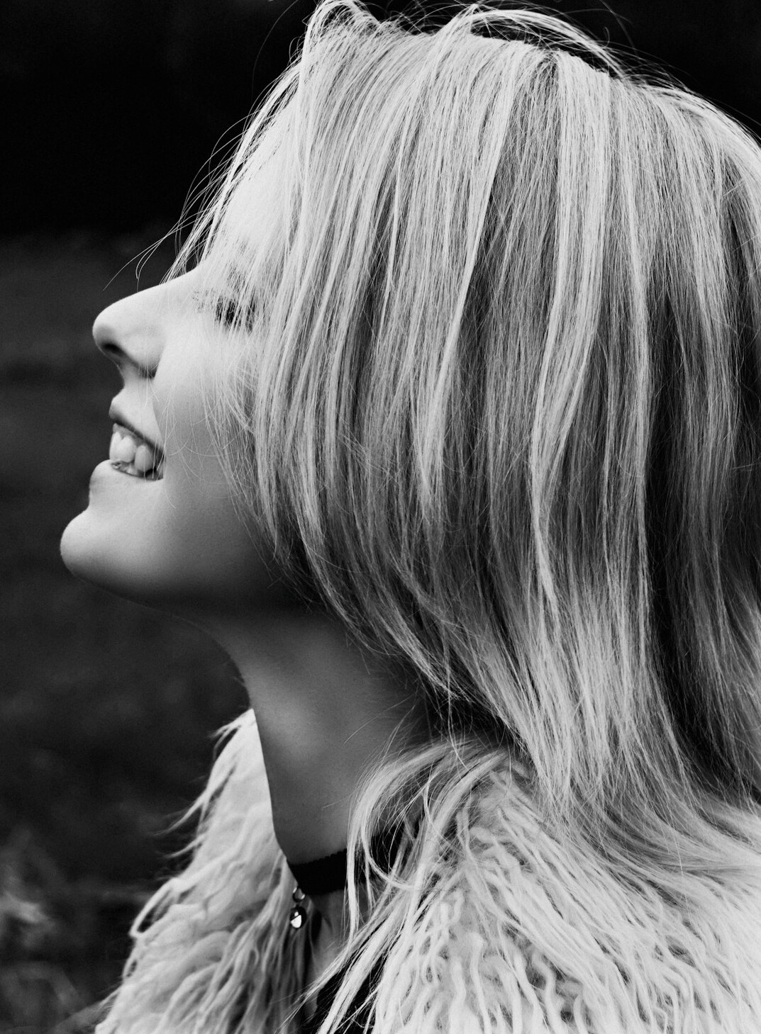 Portrait of a smiling woman with shoulder-length hair